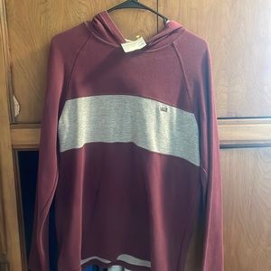 Never worn, size M. Vans maroon and grey long sleeve hoodie.